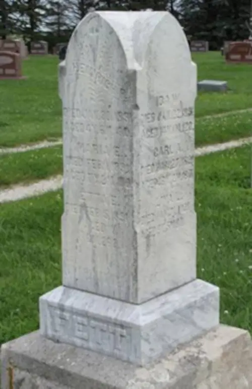 A headstone pillar designating the loss of an entire family.
